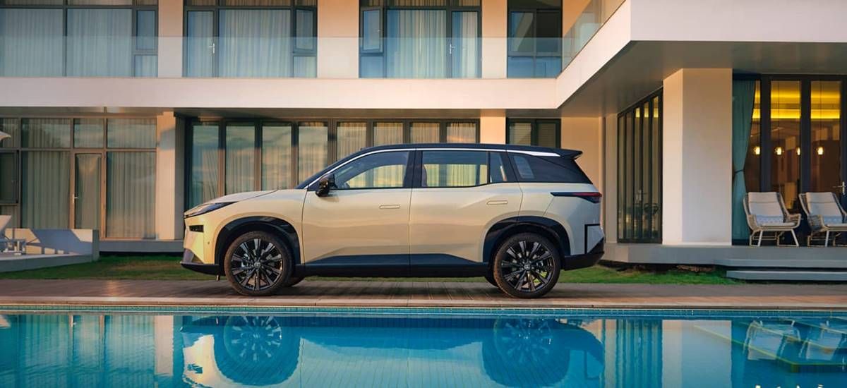 Toyota bZ3X side view by pool